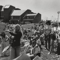 Students canoeing in the pond.